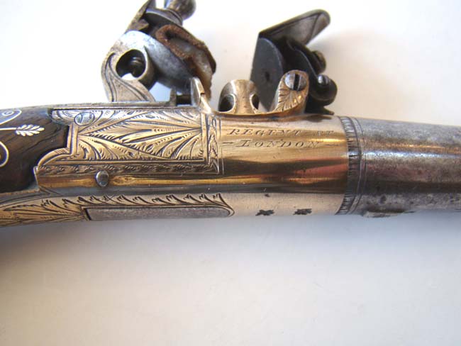 A Cased pair of Antique silver mounted Flintlock Pocket Pistols by James Collins, London, circa 1825-1832 — image 4